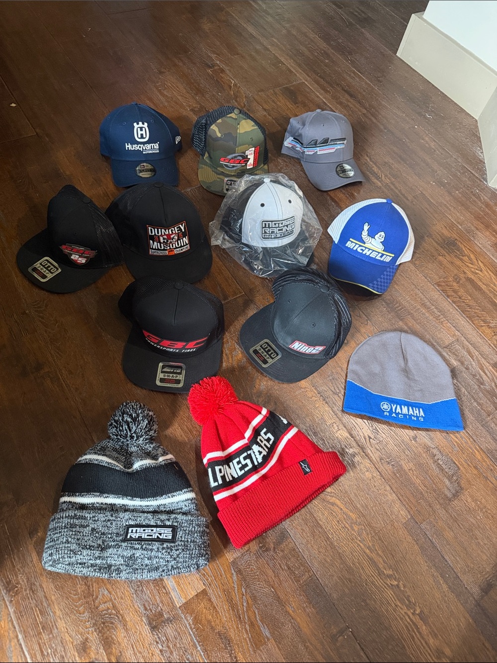 12 Racing brand Hats -9 are New 3- used